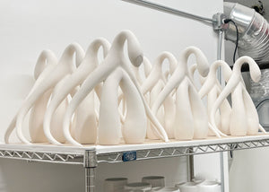 Swan Series ceramic sculptures by Sophia Wallace. This group is stoneware after the first firing, before being glazed. 