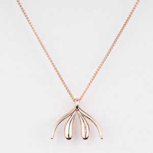 Unconquerable necklace in 14k rose gold by Sophia Wallace, view of back of pendent. #cliteracy