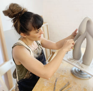 Artist Sophia Wallace working on a swan series sculpture in her Brooklyn studio, October 2021.