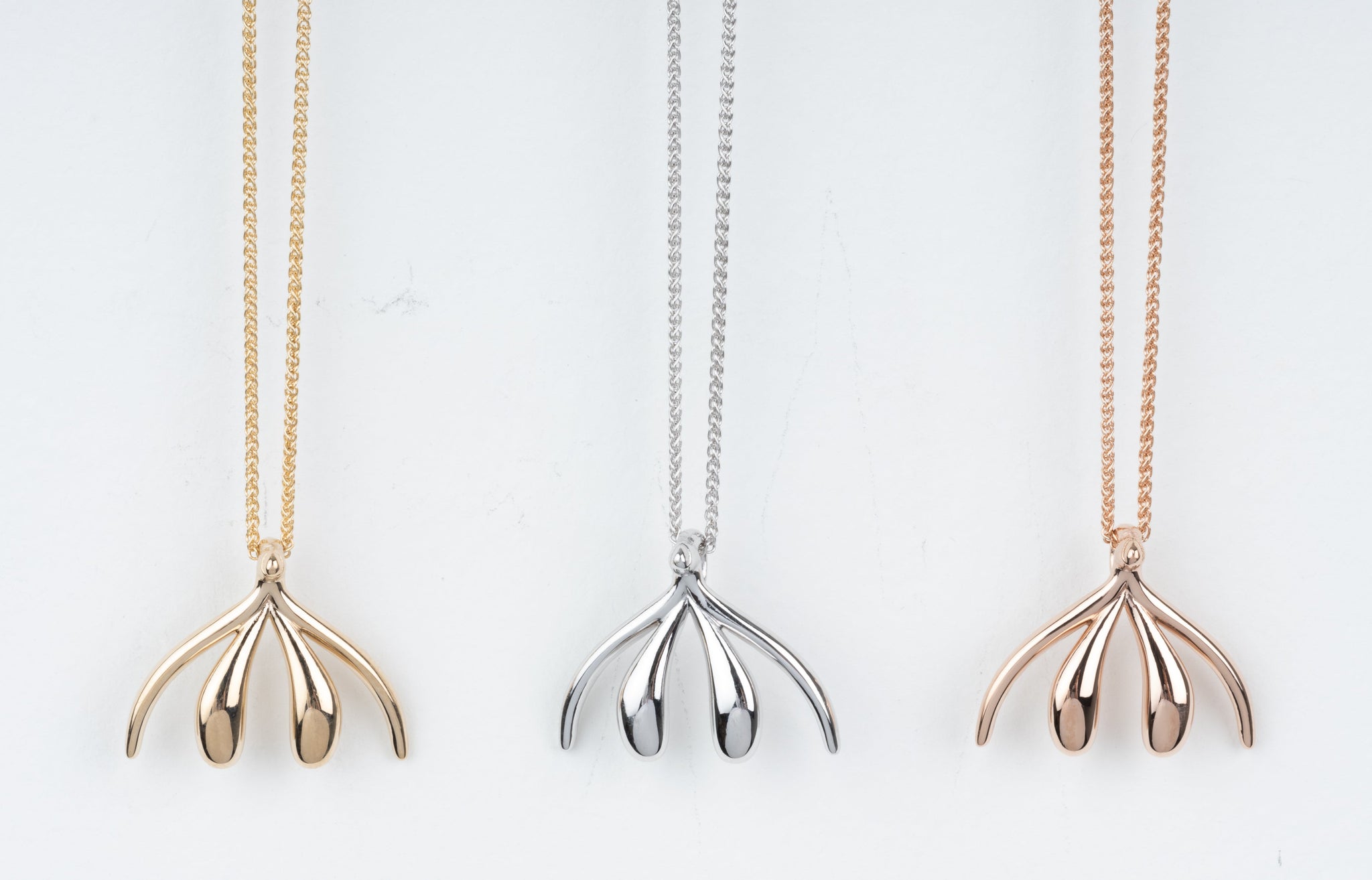 Left to right: 14k Solid Yellow, White and Rose Gold. Unconquorable Necklace (Heirloom) by Sophia Wallace