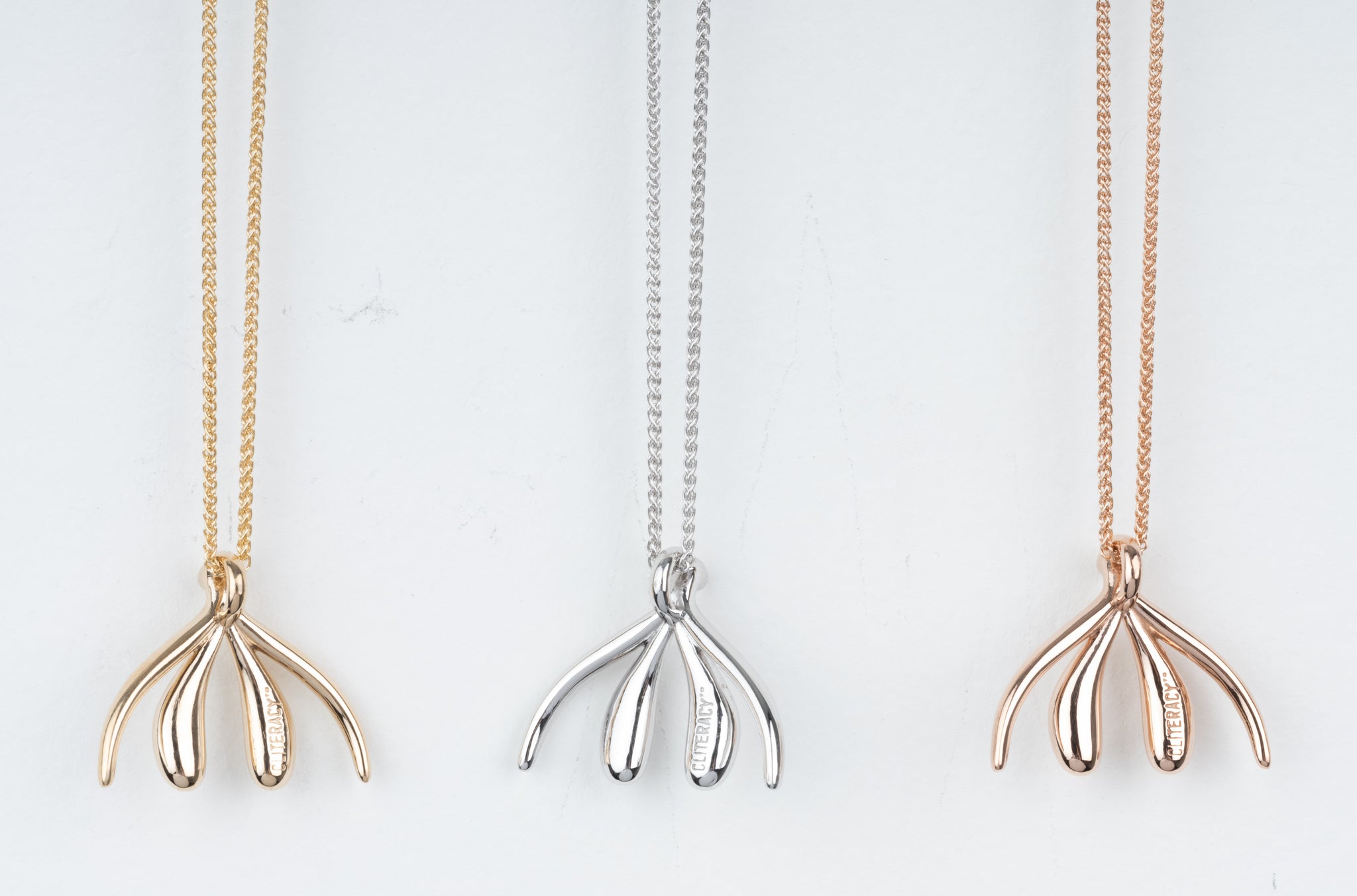 Left to right: 14k Solid Yellow, White and Rose Gold. Unconquorable Necklace (Heirloom) by Sophia Wallace