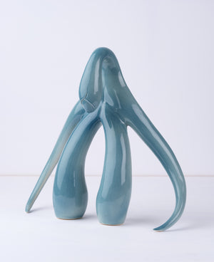 3/4 front view of "Swan Series" ceramic sculpture in aqua by Sophia Wallace, 2022.
