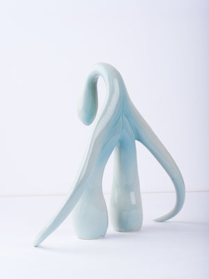 3/4 back view of "Swan Series" ceramic sculpture in light aqua by Sophia Wallace, 2022.