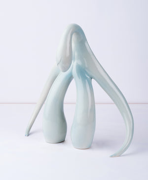 3/4 front view of "Swan Series" ceramic sculpture in light aqua by Sophia Wallace, 2022.